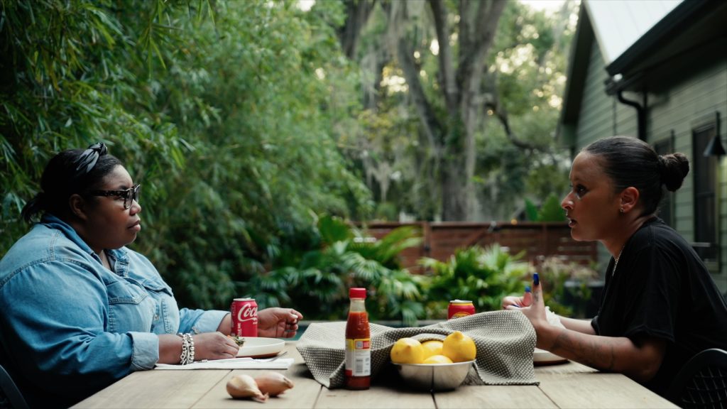 Filmmaker and food anthropologist Deb Freeman is shown interviewing a chef in a scene from the documentary film Finding Edna Lewis