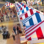 An image shows food tents at the Red River Revel in 2012